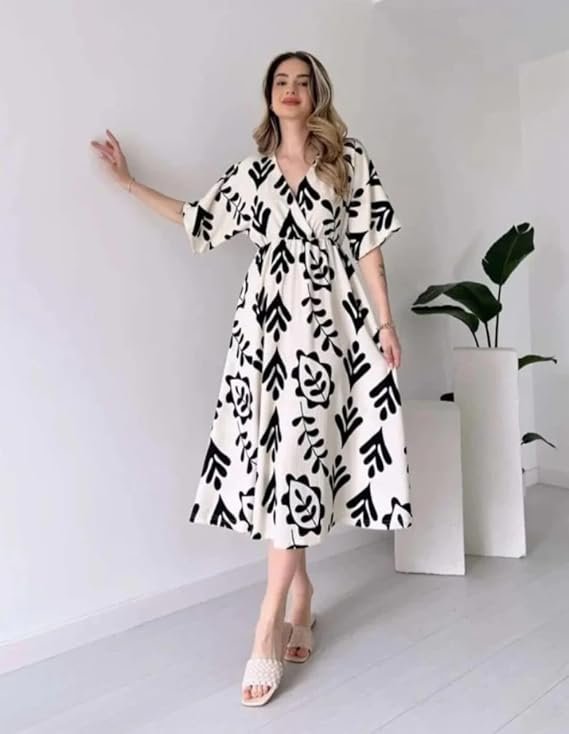 Lightweight floral maxi dress for women in tropical print, perfect for beach vacations and summer brunches.
