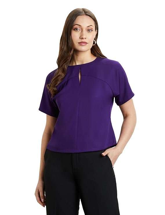 A purple relaxed fit short length top with half sleeves and a round neck, perfect for a casual chic outfit.