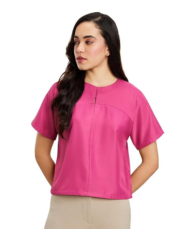 A vibrant magenta pink relaxed fit crop top with short sleeves and a round neck for a pop of color.