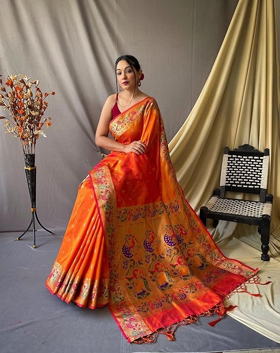 Elegant Women's Paithani Soft Lichi Silk Kanjivaram Saree in vibrant Orange with intricate peacock motifs and matching blouse piece – Perfect for parties.