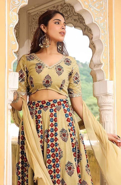 Beige and light mustard floral printed cotton lehenga choli with dupatta set for Navratri and festive occasions.