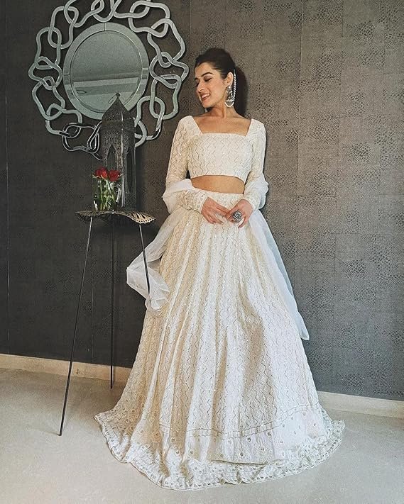 White and pink embroidered lehenga and crop top set with net dupatta shrug for engagement ceremony