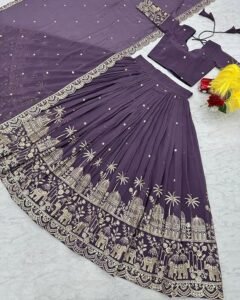 Elegant purple party wear lehenga with intricate golden embroidery, featuring ethnic motifs of elephants and domes, laid flat with blouse and dupatta.
