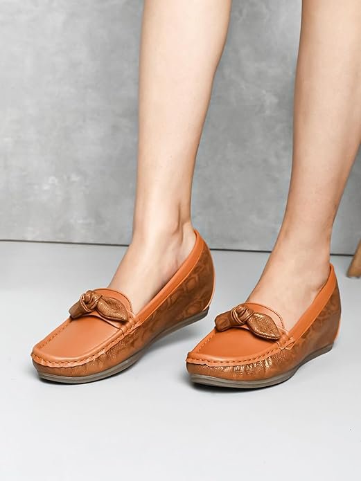 Mustard yellow women’s heeled loafers for stylish wear